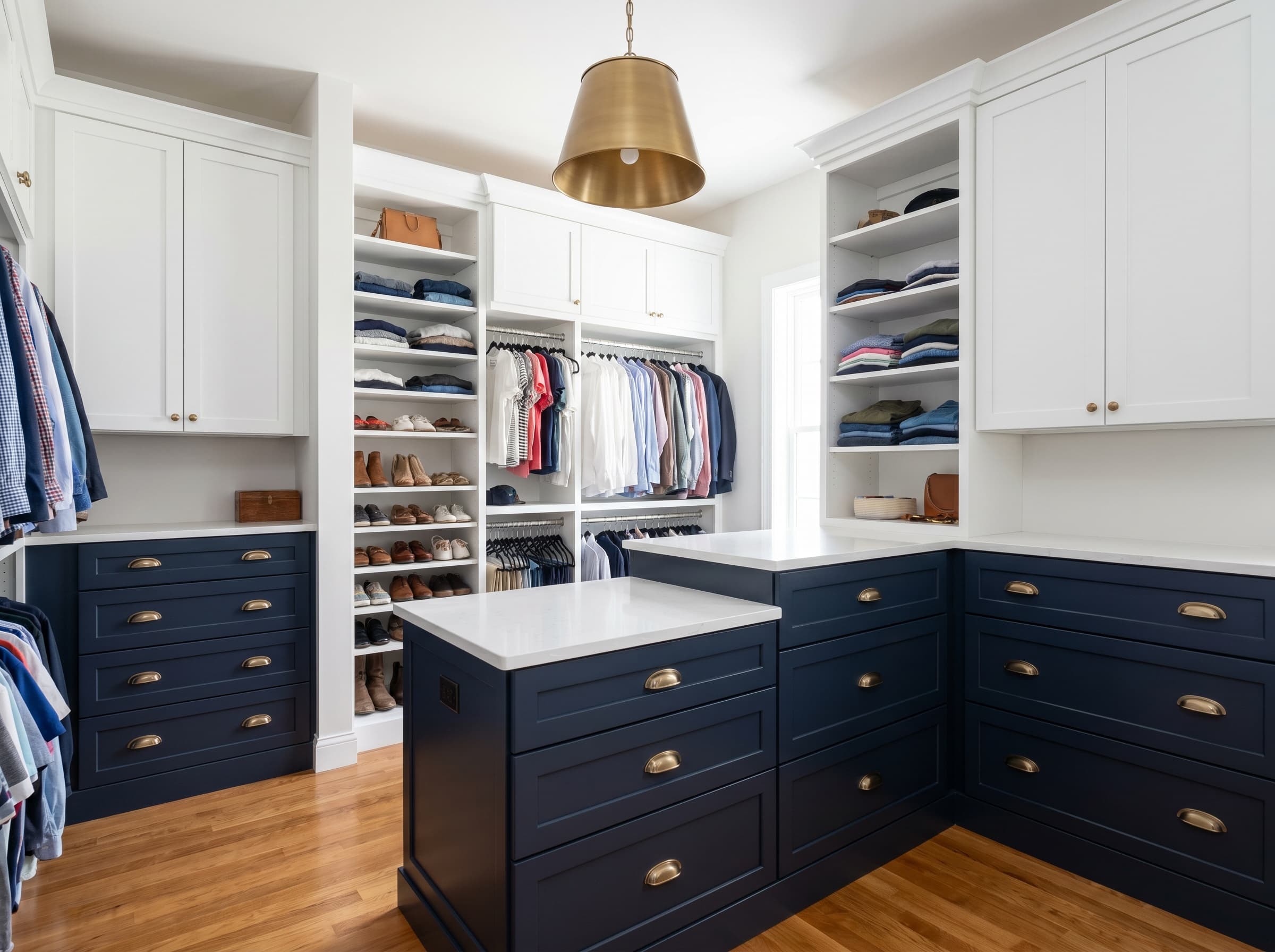 Lawrenceville, GA · Two-tone walk-in: white uppers, navy lower drawer bases.