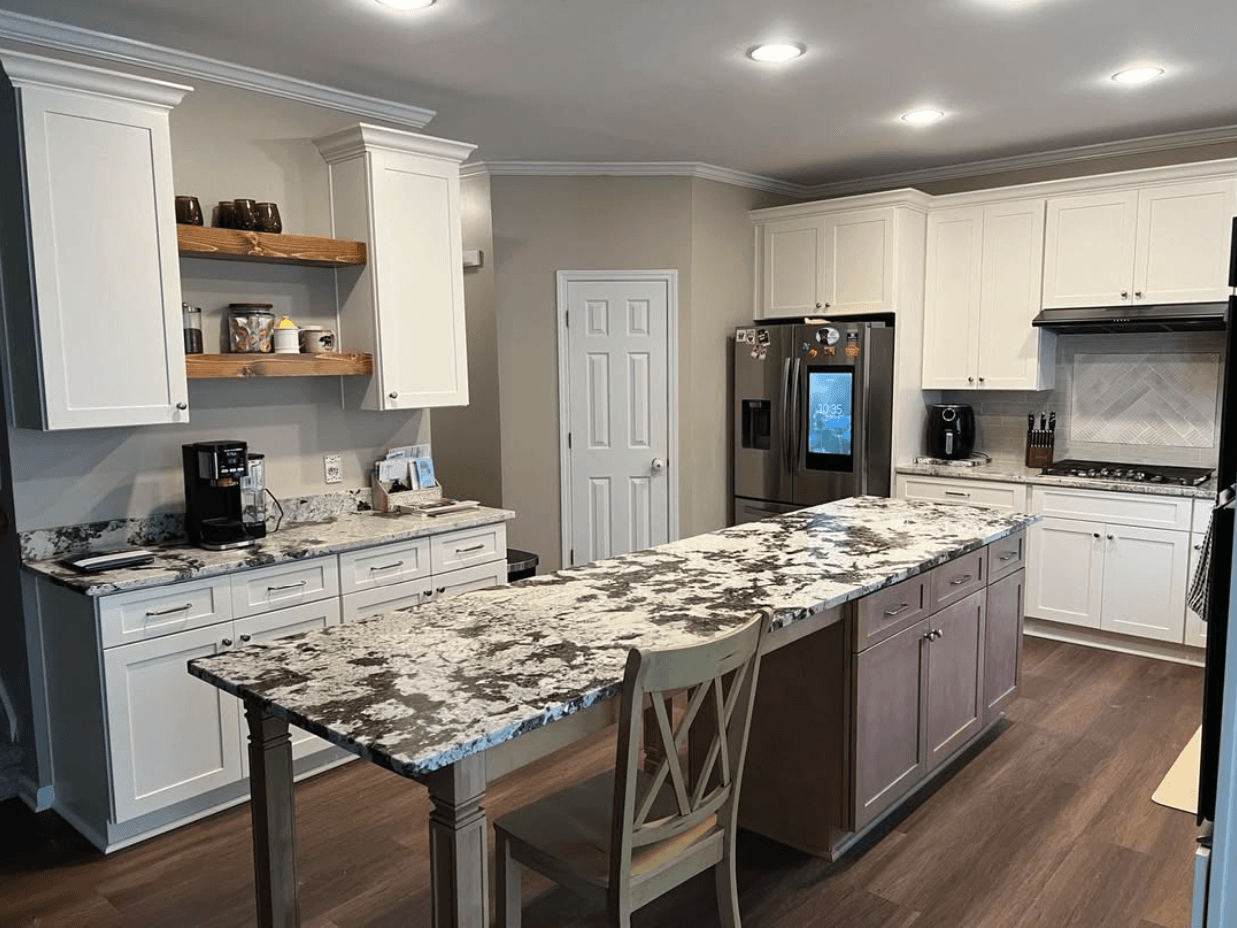 Alpharetta, GA · White shaker kitchen with stained walnut island and floating shelves.