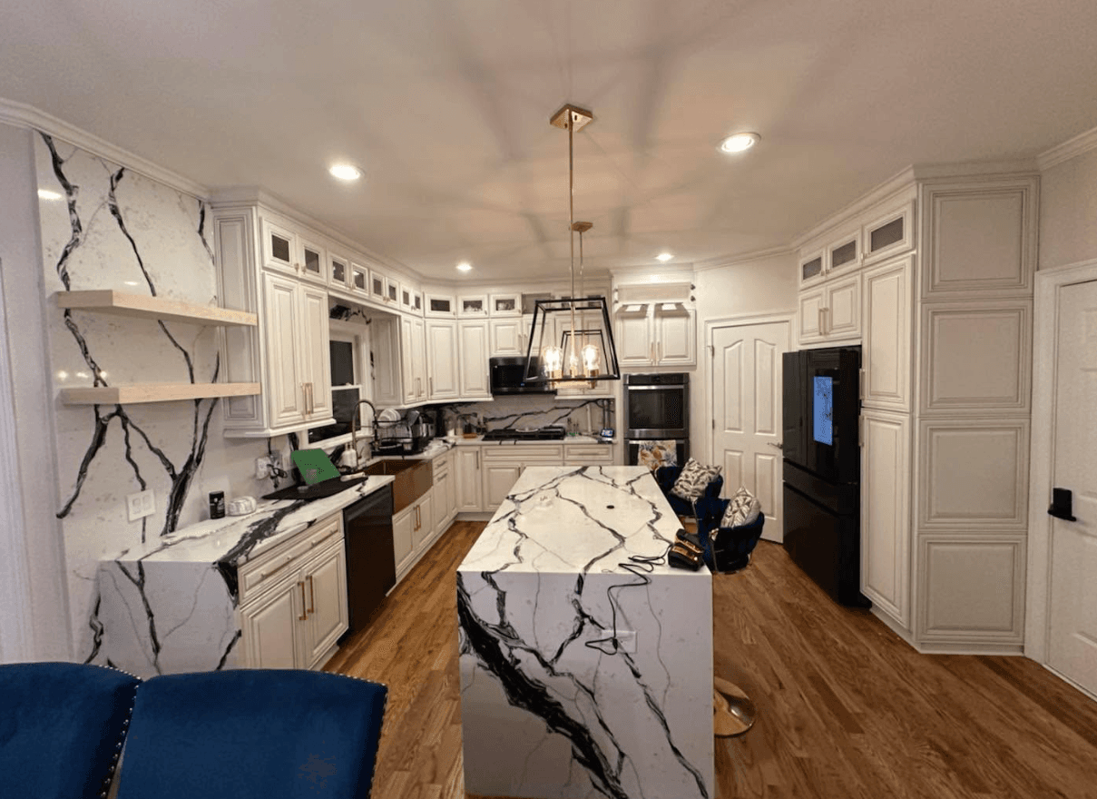 Brookhaven, GA · White shaker U-shape with bar seating at the island.
