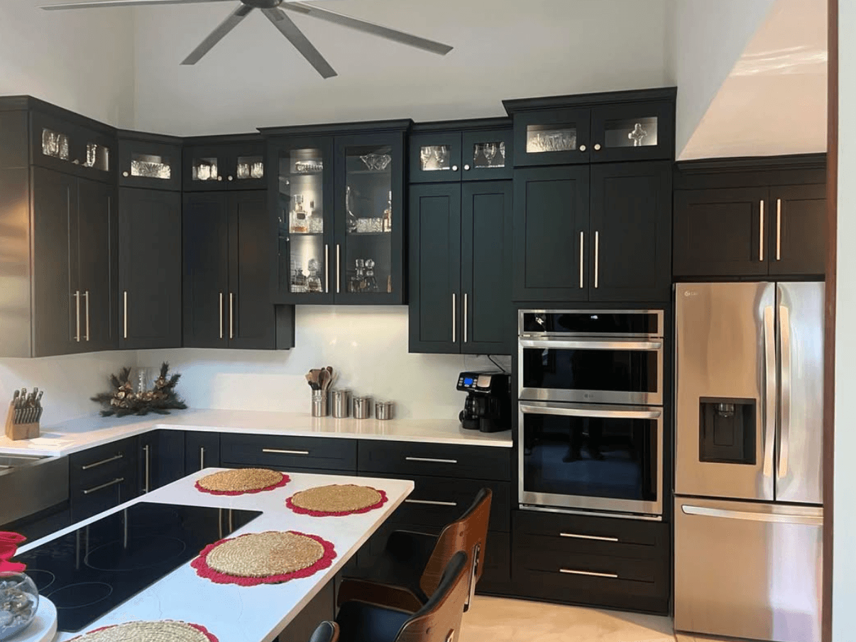 Acworth, GA · White shaker with quartz countertop and brushed nickel cup pulls.
