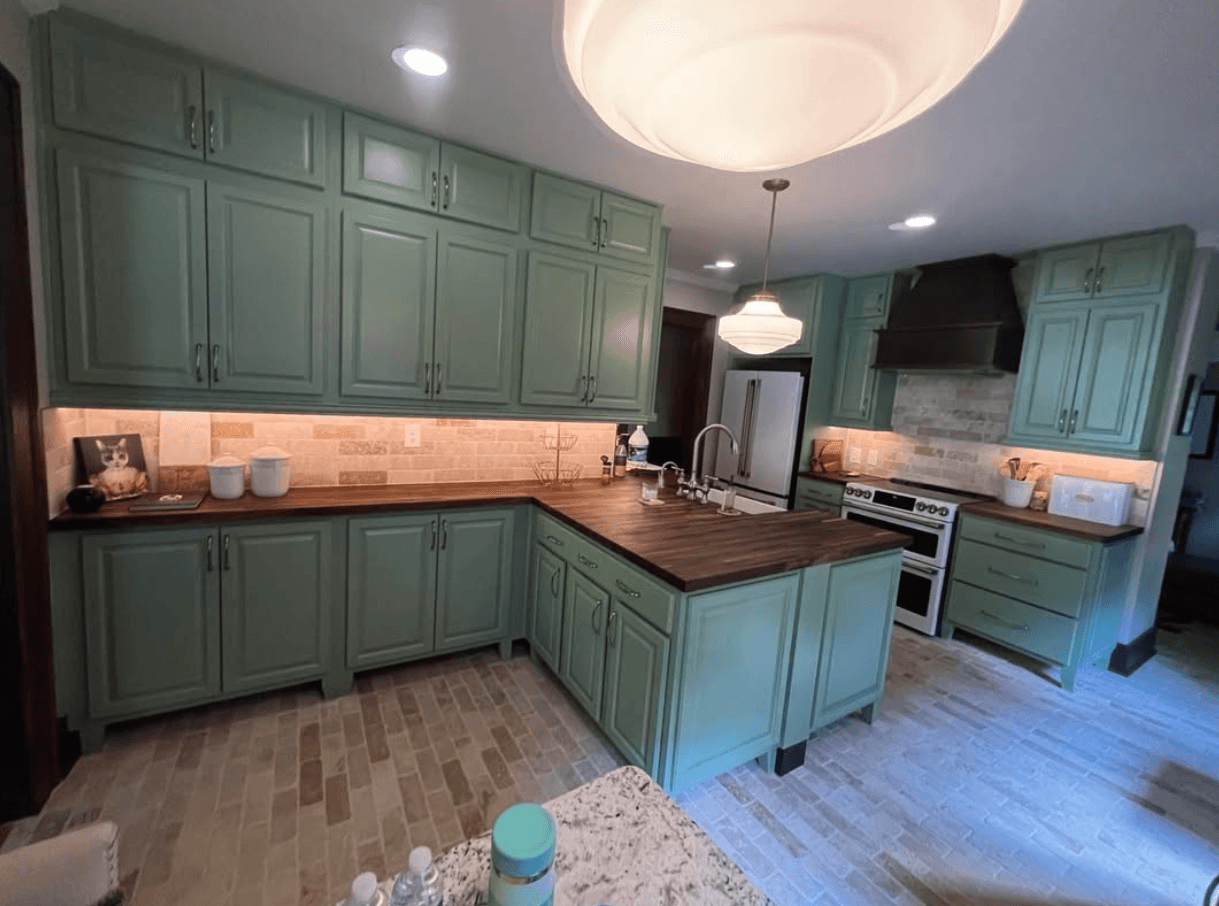 Milton, GA · White U-shape with pendant lights and floor-to-ceiling pantry tower.