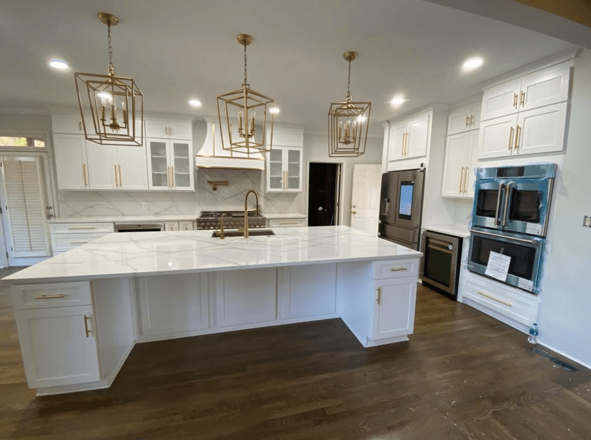 Peachtree Corners, GA · Open-concept white shaker with bar-height island seating.