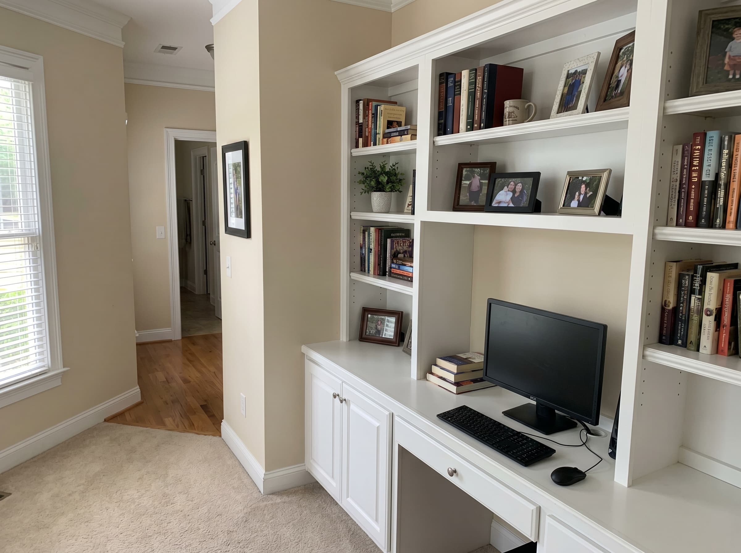 Cumming, GA · Built-in shelving and desk along one wall.