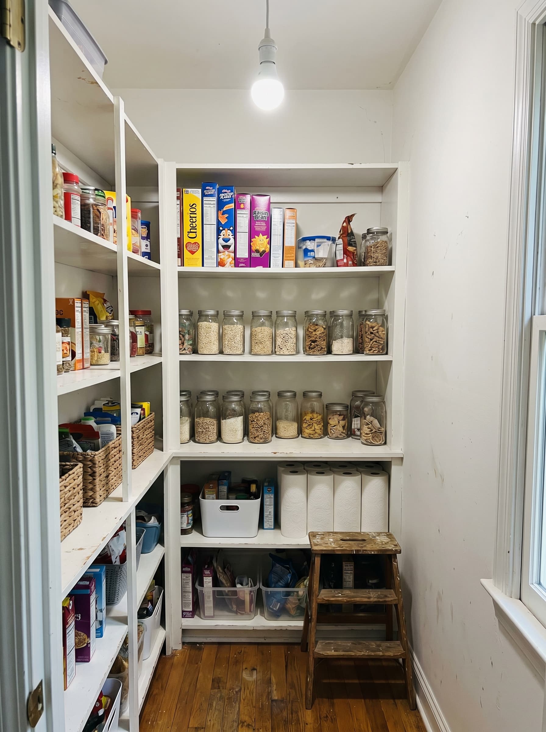 Buford, GA · Small kitchen pantry with adjustable melamine shelves.