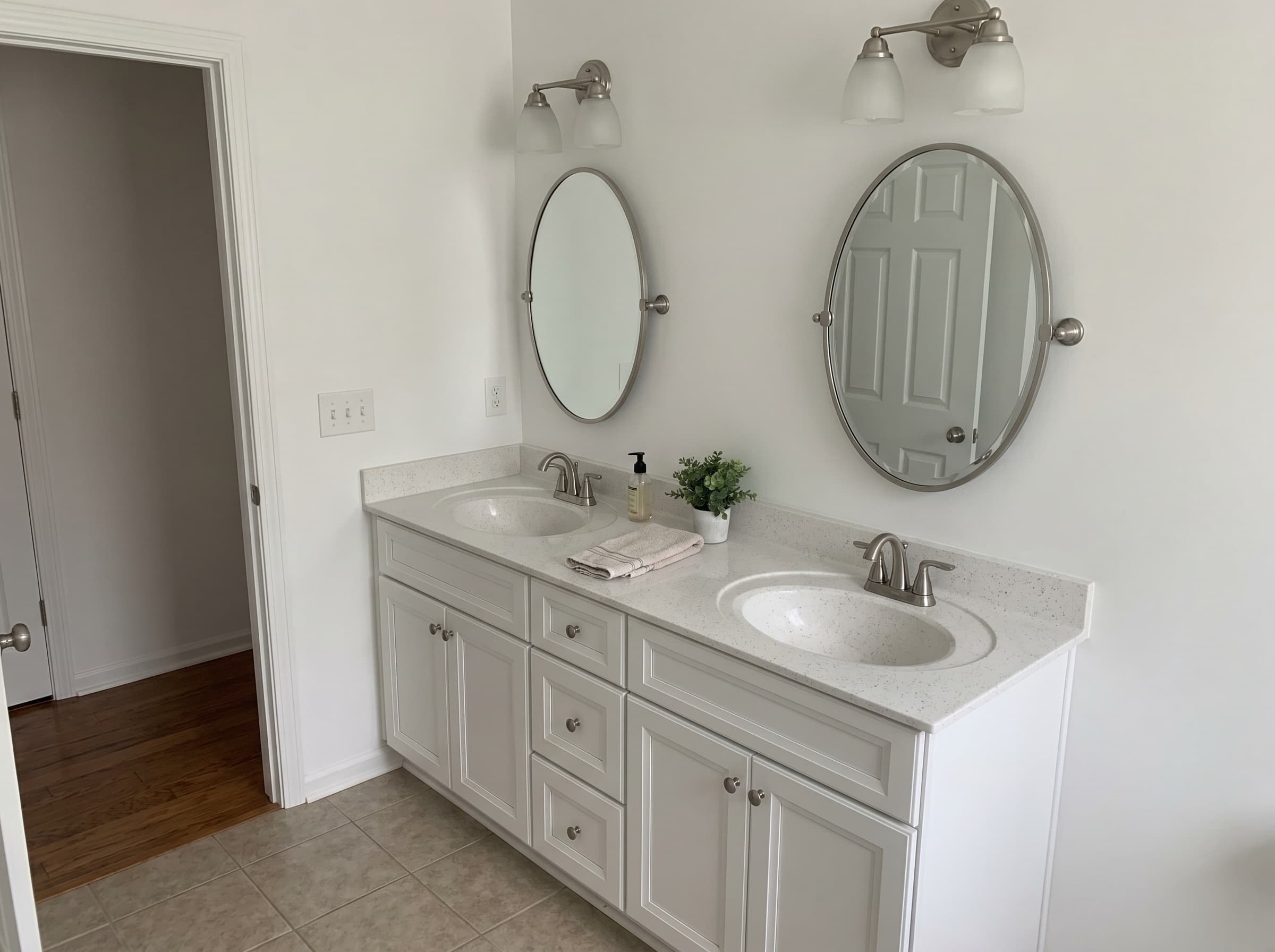 Roswell, GA · 60 inch double sink vanity with cultured marble top.