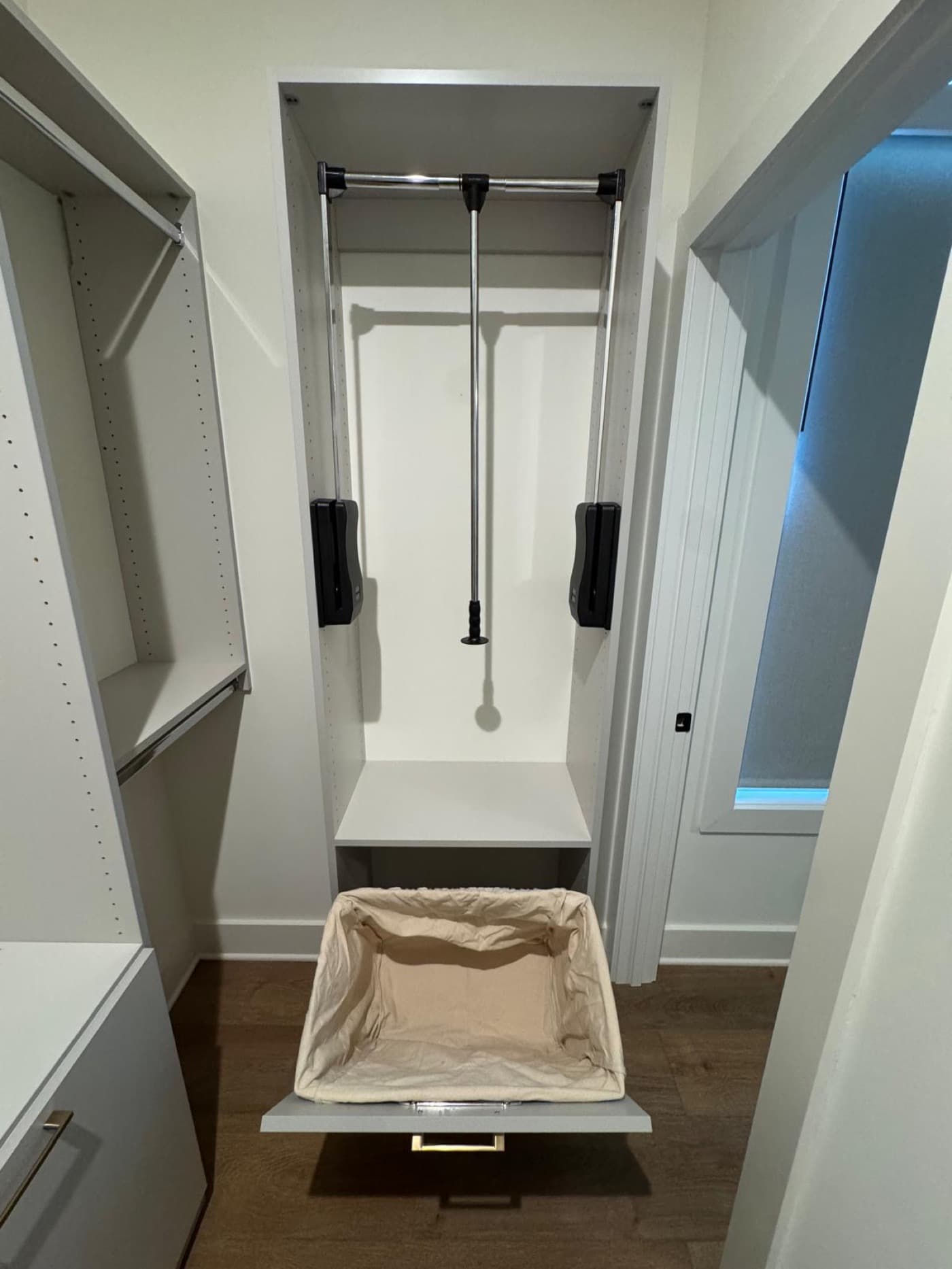 Marietta, GA · Custom walk-in with LED-lit wood shelving and island.
