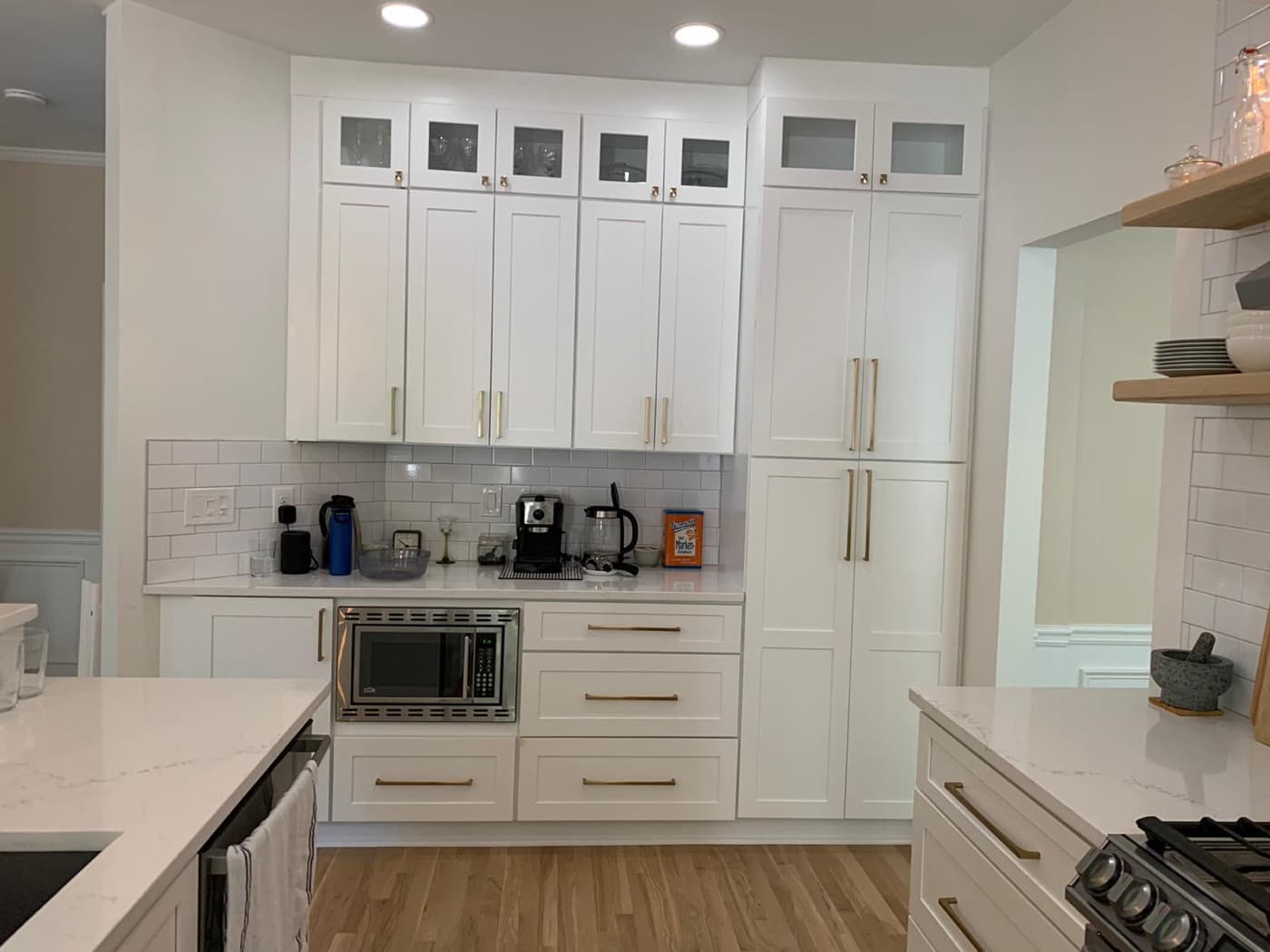 Marietta, GA · White kitchen with subway backsplash and stainless appliances.