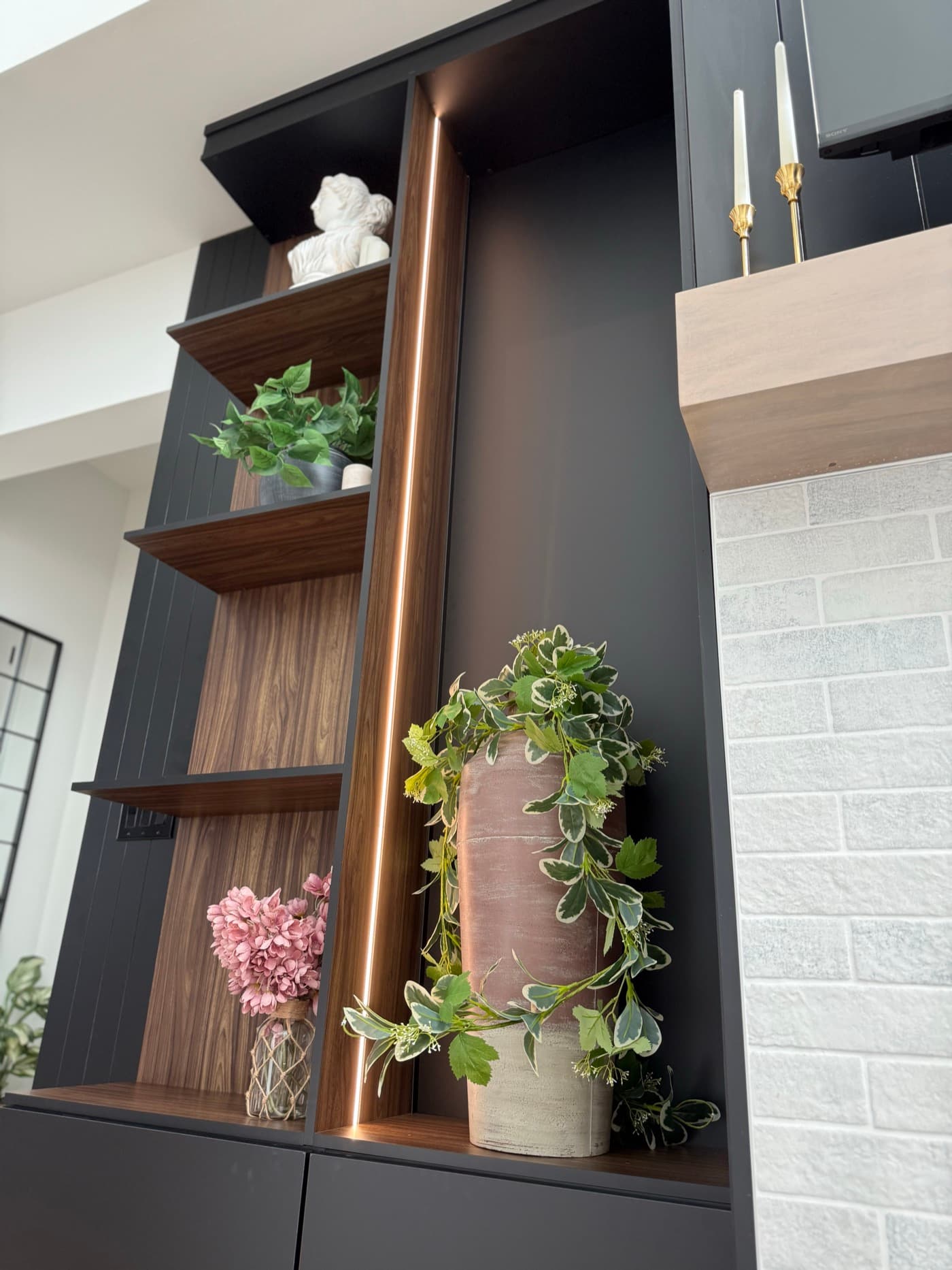 Duluth, GA · Library built-ins with integrated lighting.