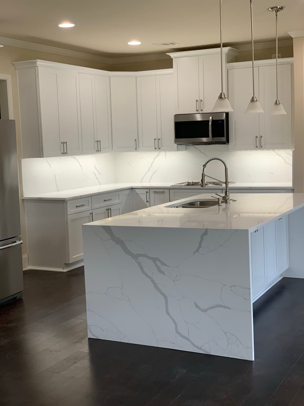 Decatur, GA · Double vanity with soft-close drawers and stone top.