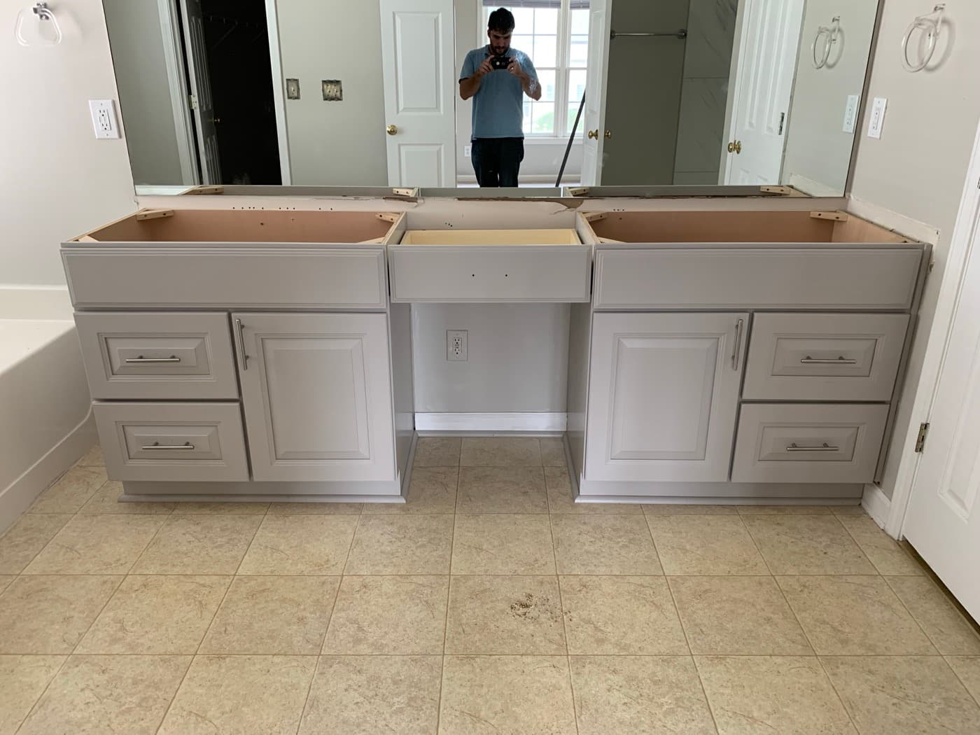 Smyrna, GA · Custom bathroom vanity with quartz top.