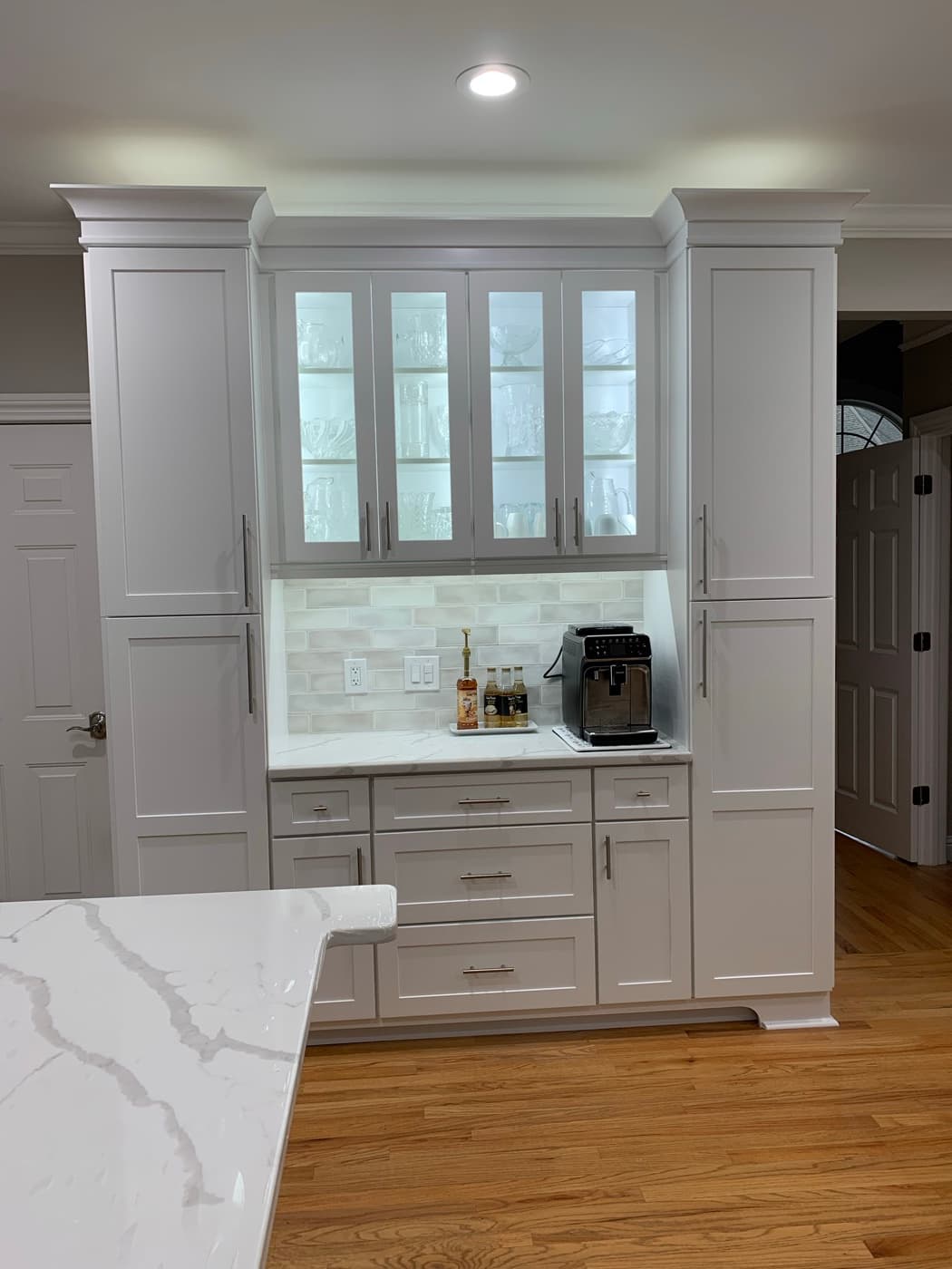 Acworth, GA · White kitchen with subway backsplash and stainless appliances.