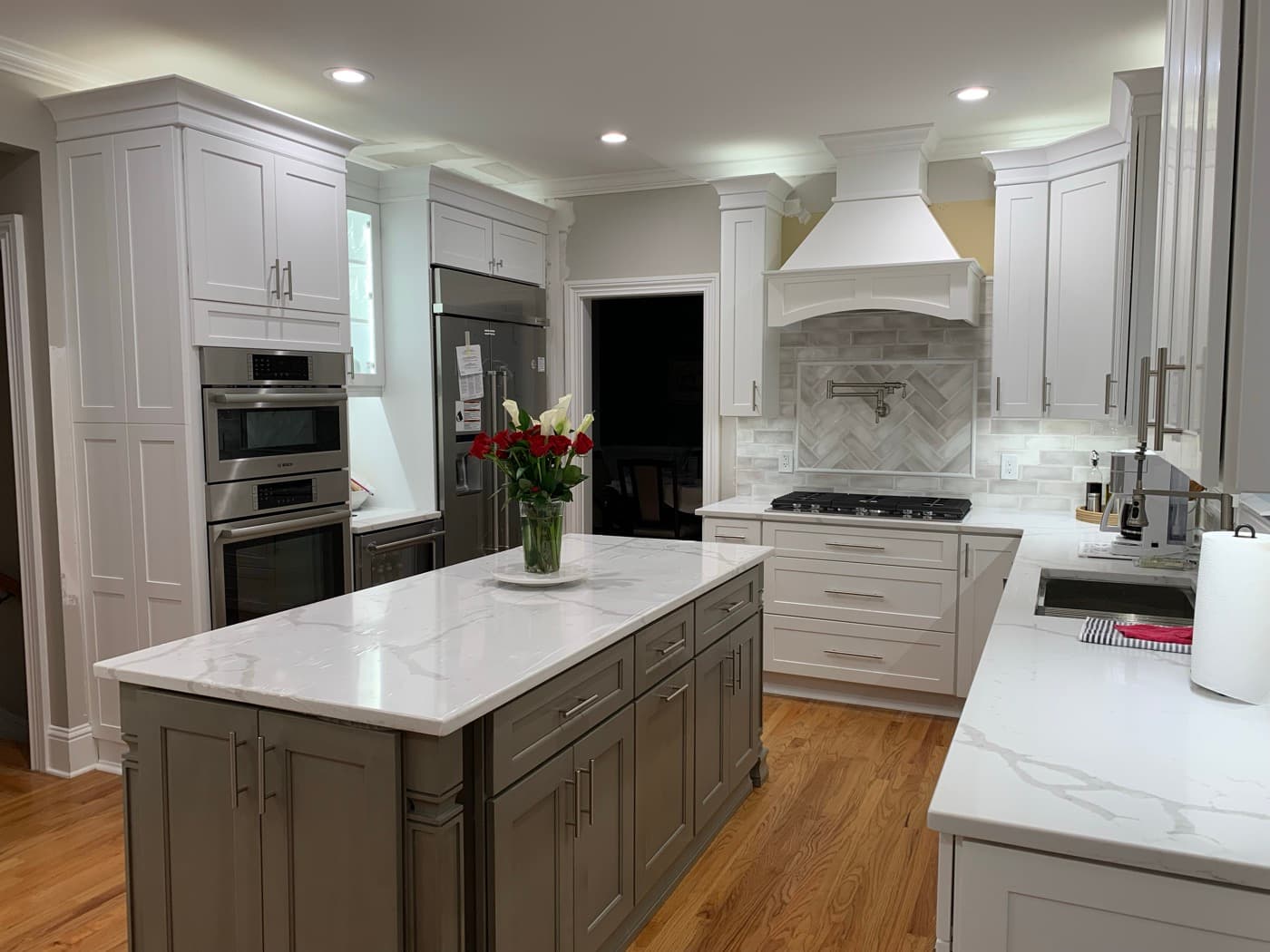 Canton, GA · Open-concept kitchen with bar-height island seating.