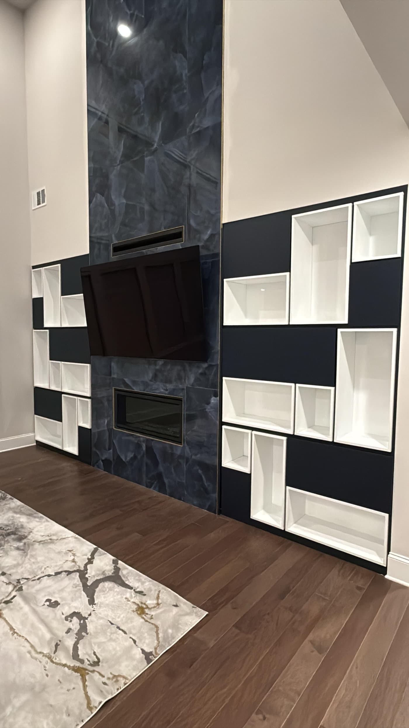 Brookhaven, GA · Reach-in closet with adjustable shelving and drawer bank.